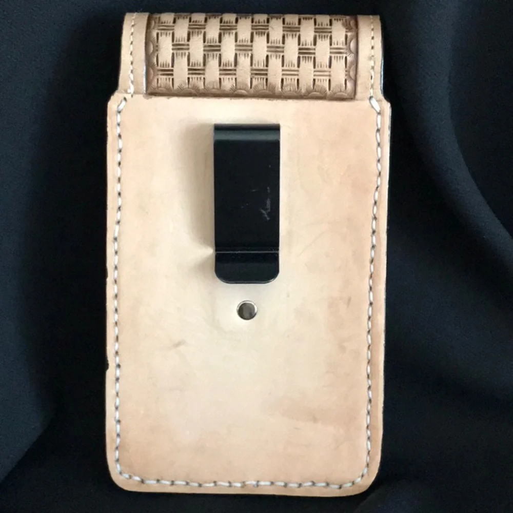 Handmade all leather cell phone carrier.